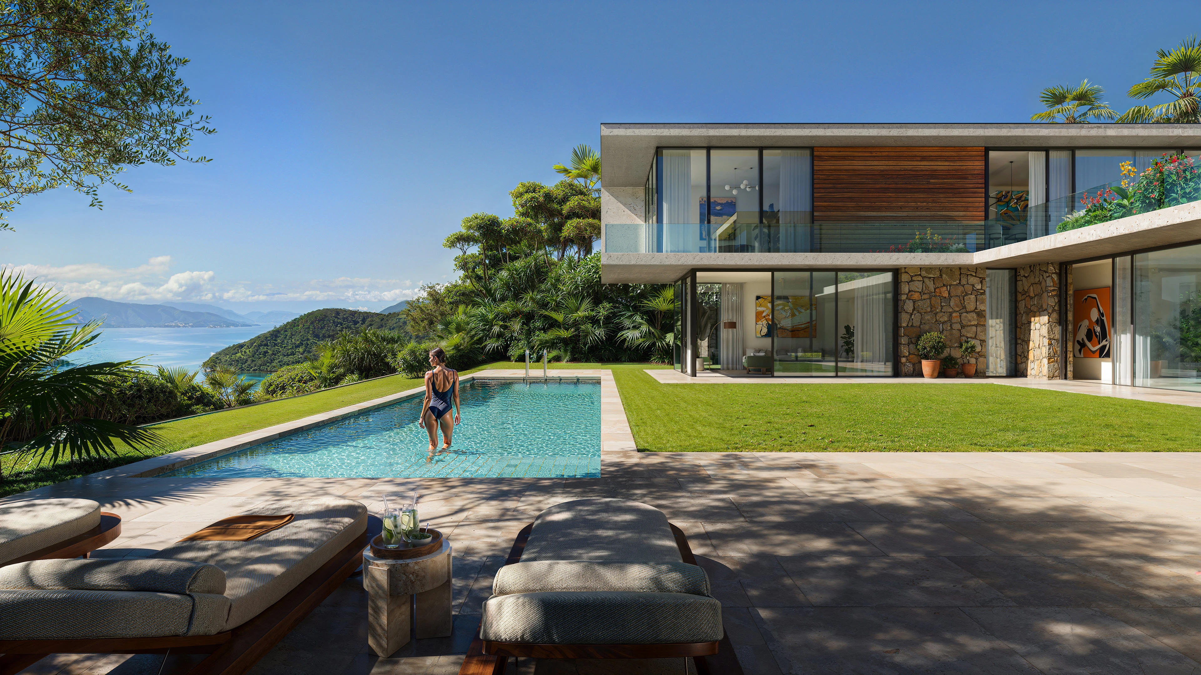 Modern luxury villa with infinity pool overlooking hills and coastline